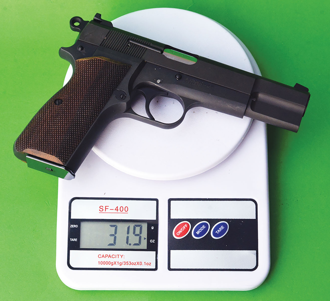 With an empty magazine installed, the SA-35 weighs 31.9 ounces and is constructed of steel.